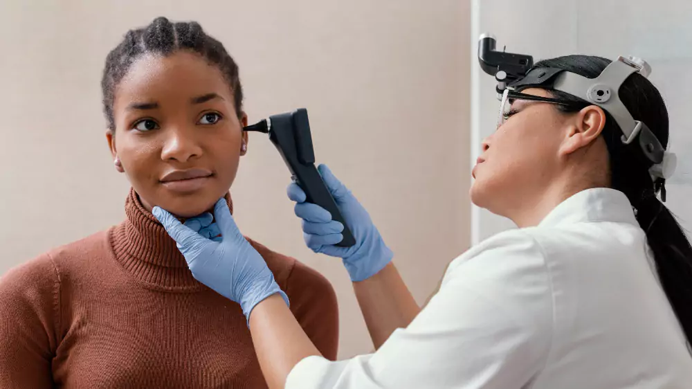 Doctor Checking Patient Ears