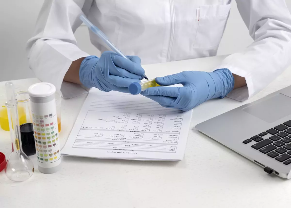 Lab Doctor Performing Exam Urine